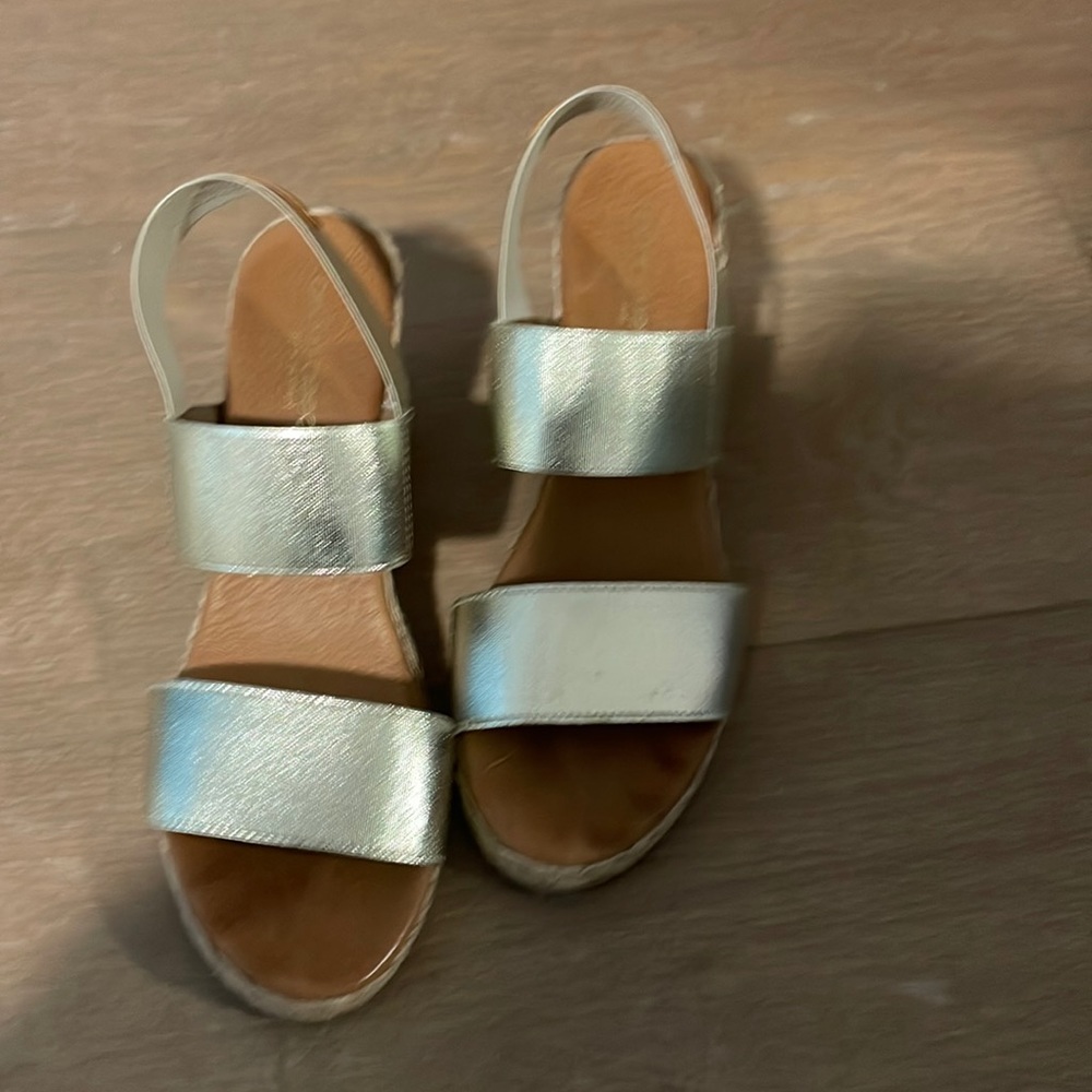 Gold wedge sandals gently worn